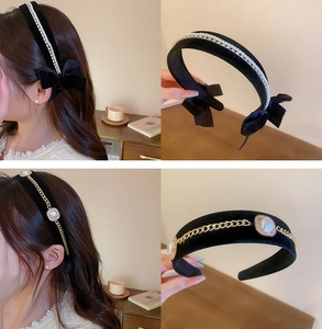 Detailed view of French vintage velvet headbands with pearls, rhinestones and gold chains