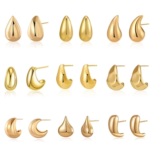 Set of nine gold-plated teardrop and crescent stud earrings with a high-polished finish