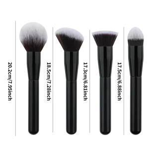 Detail of four makeup brushes with dimensions ranging from 17.3cm to 20.2cm on white background