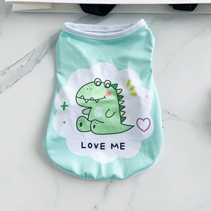 Detail of mint green breathable dog vest featuring a cartoon dinosaur and LOVE ME print
