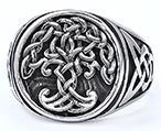 Detail of vintage silver Viking Celtic ring featuring Tree of Life relief and braided texture