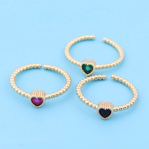 Three 18k gold plated heart-shaped rings in red, green, and blue with beaded adjustable bands