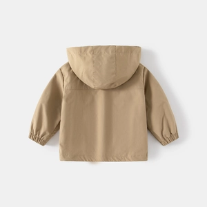 Close-up of khaki hooded jacket showing windproof fabric texture and elastic cuffs
