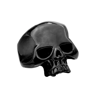 Polished black stainless steel skull ring for men in punk style on white background