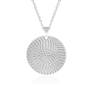 Detailed view of silver stainless steel necklace with textured woven circular pendant
