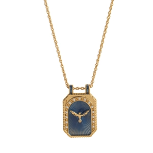 Macro detail of gold tarot necklace featuring a blue pendant with a golden bird relief
