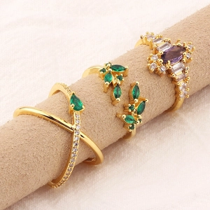 Three-piece gold-plated ring set with emerald green and purple zircon gemstones