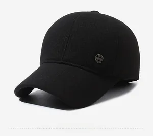Close-up of winter warm baseball cap showing the side metallic Sport logo and knit texture
