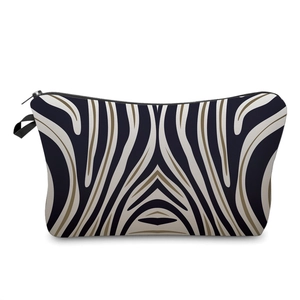 Close-up of animal print makeup bag with zebra stripes and high-quality black zipper