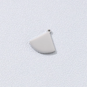 Minimalist silver fan-shaped titanium steel pendant with a polished finish on white background