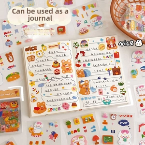 Close-up of cute cartoon bear stickers applied to a DIY journal page layout