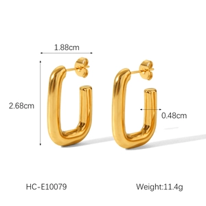 Detail view of gold titanium steel earrings with dimensions 1.88cm x 2.68cm and 11.4g weight