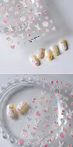 Detail of TS-3780 3D embossed nail stickers with cute bunnies and heart patterns