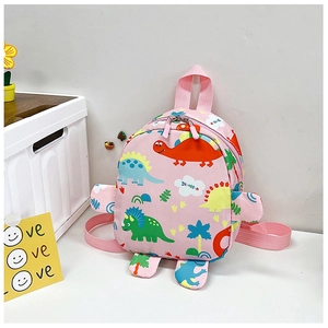 Detail of pink dinosaur backpack with 3D elements and cartoon prints for children