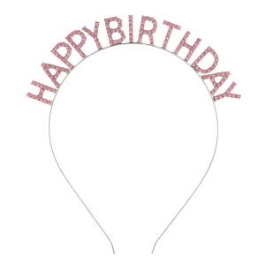 Detailed close-up of metal headband featuring pink rhinestone Happy Birthday lettering