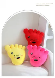 Detailed plush foot pillow set with cartoon smiles and insect embroidery on soft sofa