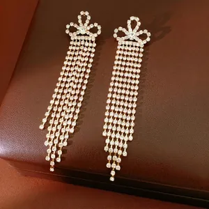 Vintage gold bow earrings with crystal long tassels on premium leather jewelry box