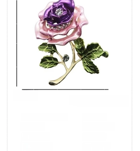 Detailed view of enamel rose flower brooch with rhinestone inlay measuring 3.8 cm