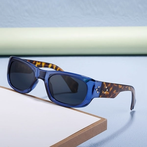 Polarized retro sport sunglasses with blue translucent frame and tortoiseshell temples