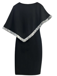 Detail of black slim-fit dress featuring a silver sequined asymmetrical shawl overlay
