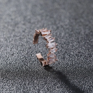 Adjustable rose gold ring for women with baguette cut cubic zirconia in a minimalist style