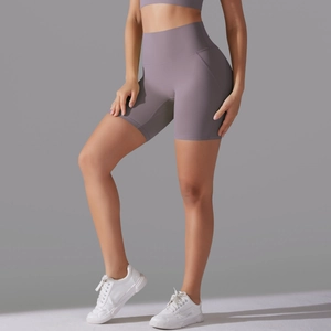 Detailed view of high-waisted seamless yoga shorts in smoke grey with soft matte texture