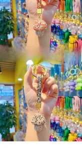 Detailed close-up of handmade mushroom keychain with full rhinestones and metallic ring