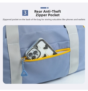 Large capacity travel duffel bag detail showing the back anti-theft zipper pocket.
