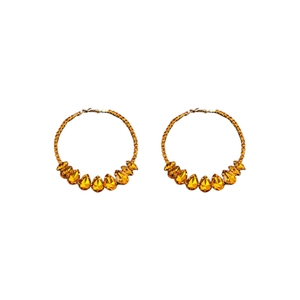 Elegant gold drop hoop earrings with yellow pear-cut crystals on white background