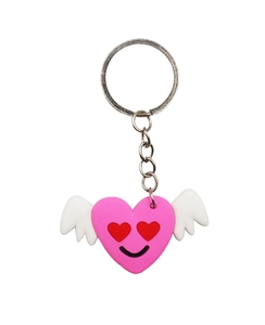 Detailed view of a pink PVC heart keychain with wings and metallic ring attachment