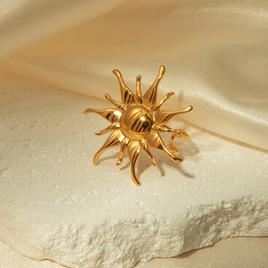 Golden double layer sunburst open ring in stainless steel with a polished mirror finish