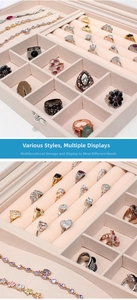 Detailed view of pink velvet jewelry organizer showing ring slots and divider sections