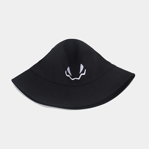 Detail view of a black cotton bucket hat with white ghost face embroidery for Halloween