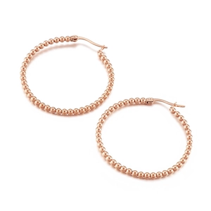 Polished rose gold beaded hoop earrings made of stainless steel with a minimalist finish