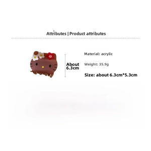 Detail view of brown acrylic cartoon kitty hair claw with dimensions 6.3cm x 5.3cm