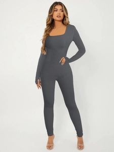 Detail of dark grey square neck long sleeve jumpsuit with ribbed knit texture
