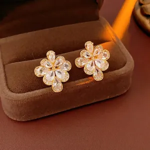 Luxury water drop flower stud earrings with sparkling white cubic zirconia in gold plating