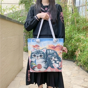 Jacquard tote bag featuring cat and goldfish patterns with white cotton rope handles
