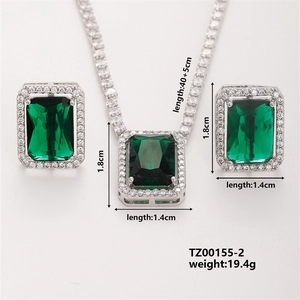 Detailed view of emerald-style jewelry set with dimensions for necklace and earrings