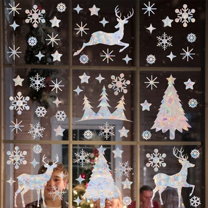 Holographic Christmas window clings featuring reindeer and snowflakes in a cozy home setting