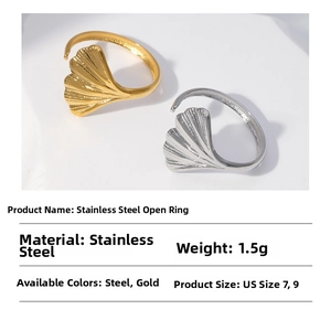 Polished ginkgo leaf open ring detail showing silver and gold color options