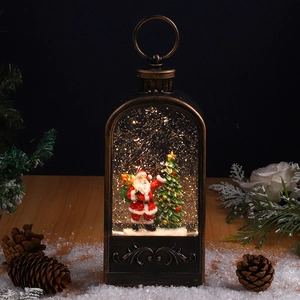 Close-up of vintage bronze Christmas lantern with Santa scene and glitter snow inside
