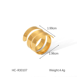 Detail view of golden spiral stainless steel ring showing dimensions 1.99cm and 4.4g weight