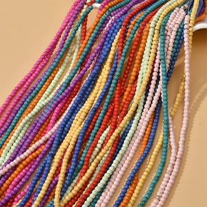 Close-up of vibrant 3mm and 4mm turquoise loose beads for DIY jewelry making