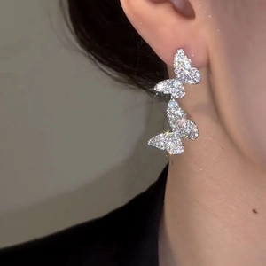 Sparkling double butterfly stud earrings with silver needles and micro-set zirconia crystals