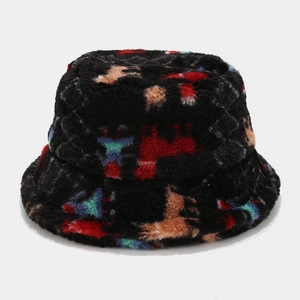 Detail of plush bucket hat featuring colorful abstract patterns on a soft black fuzzy texture