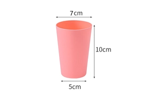 Pink stacking cup dimensions detail showing 10cm height and 7cm top diameter for children