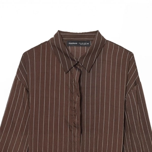 Classic brown vertical striped long sleeve shirt with collar detail on a white background