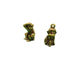 Pair of antique bronze monkey figurines and pendants with vintage brass finish and rustic texture