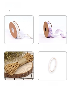 Macro view of DIY gift wrapping set with printed ribbon, colorful tape, and hemp rope